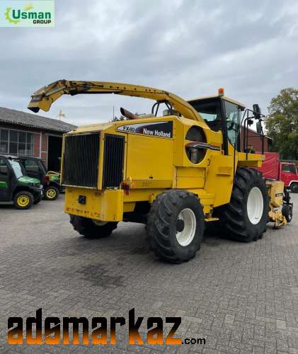 New Holland FX 40 with champion kamper 345