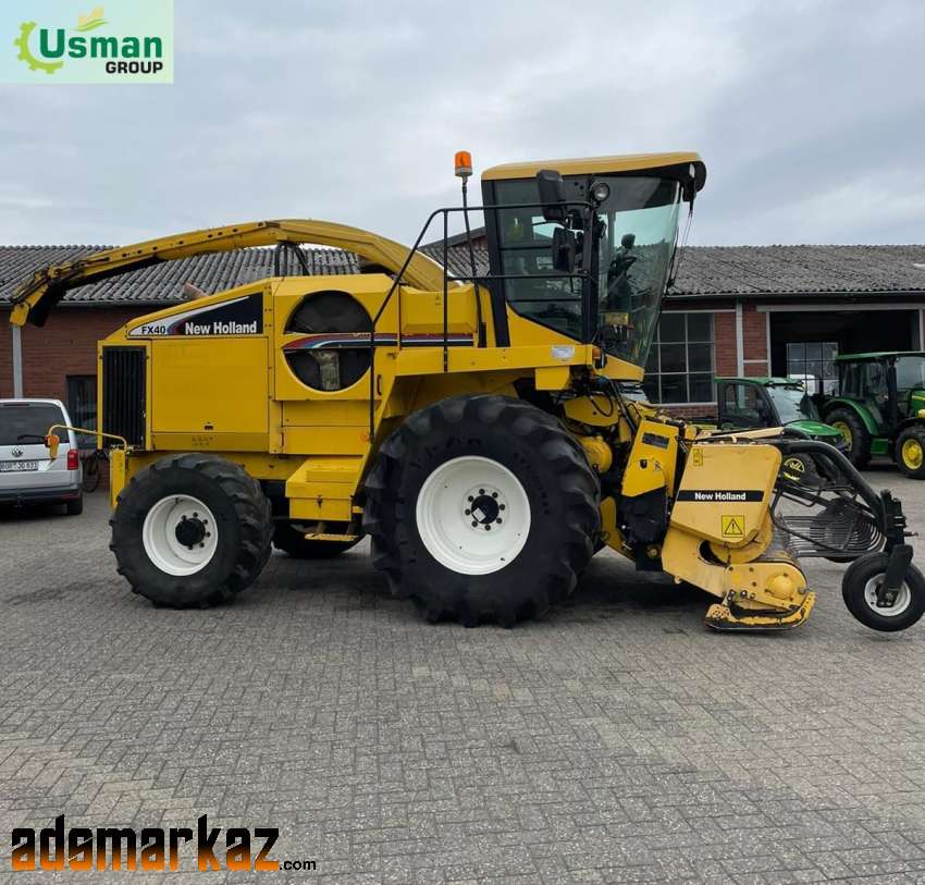 New Holland FX 40 with champion kamper 345