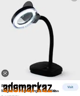 Magnifying glass with stand for sale
